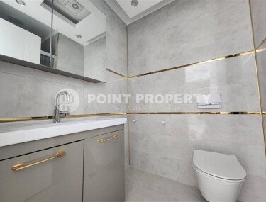 Современная светлая квартира 1+1 площадью 58 м² в жилом комплексе с развитой инфраструктурой в районе Махмутлар-id-10319-фото-5