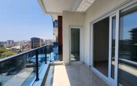A modern, bright 1+1 apartment of 58 m² in a residential complex with developed infrastructure in the Mahmutlar area-id-10319-photo-7