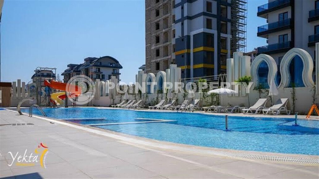 A modern, bright 1+1 apartment of 58 m² in a residential complex with developed infrastructure in the Mahmutlar area-id-10319-photo-17