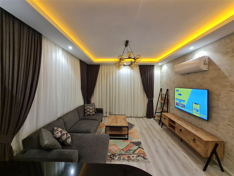 A cozy 1+1 apartment of 60 m² in a residential complex with full infrastructure in the Mahmutlar area-id-10321-photo-4