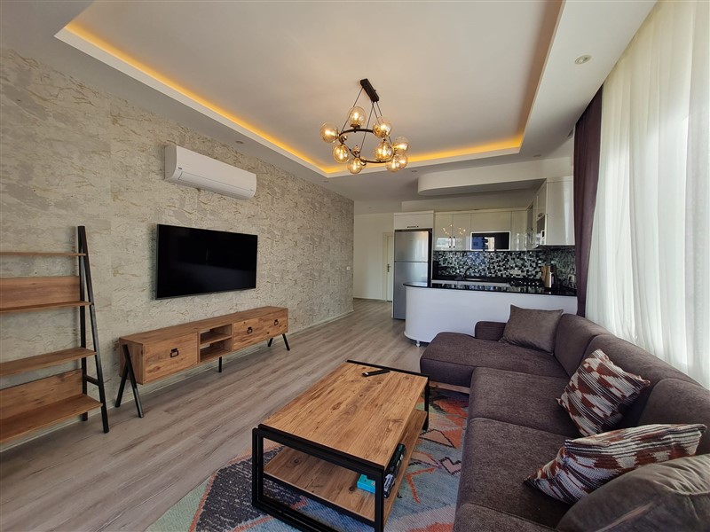 A cozy 1+1 apartment of 60 m² in a residential complex with full infrastructure in the Mahmutlar area-id-10321-photo-3