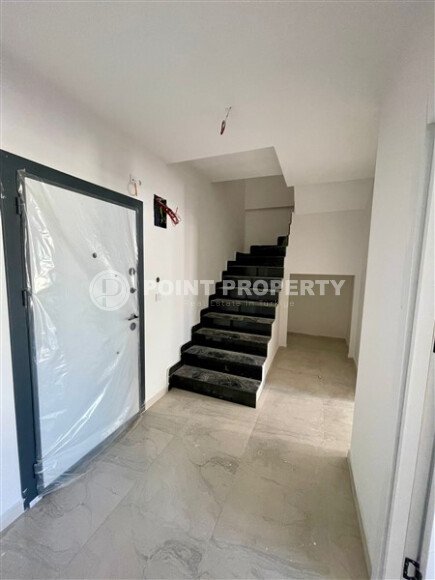 A modern two-story duplex 2+1 with an area of 120 m² in a five-star residential complex in Mahmutlar-id-10322-photo-4