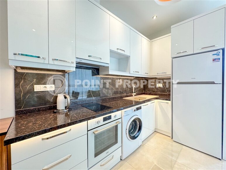 Светлая квартира 1+1, 62 м² комплексе с развитой инфраструктурой в Махмутларе-id-10331-фото-2