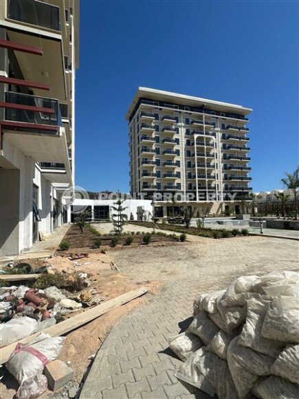 A spacious, modern 80 m² apartment with sea views in Demirtaş – comfort and tranquility close to nature-id-10333-photo-2