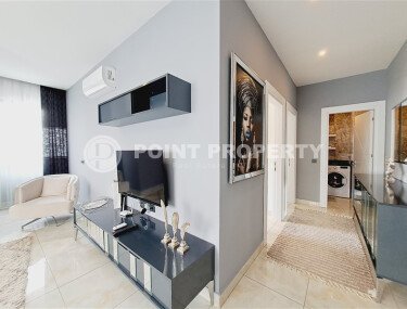 Современная светлая квартира  2+1 площадью 70 м² в центре Алании с роскошной инфраструктурой-id-10346-фото-2