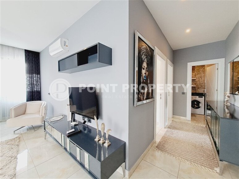 A modern, bright 2+1 apartment of 70 m² in the center of Alanya with luxurious infrastructure-id-10346-photo-2