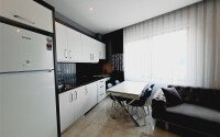 A modern, bright 2+1 apartment of 70 m² in the center of Alanya with luxurious infrastructure-id-10346-photo-3