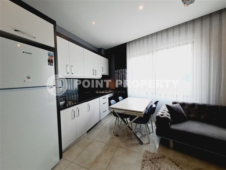 A modern, bright 2+1 apartment of 70 m² in the center of Alanya with luxurious infrastructure-id-10346-photo-3