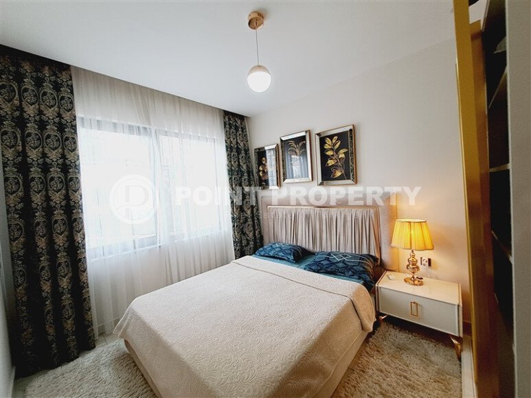 A modern, bright 2+1 apartment of 70 m² in the center of Alanya with luxurious infrastructure-id-10346-photo-5