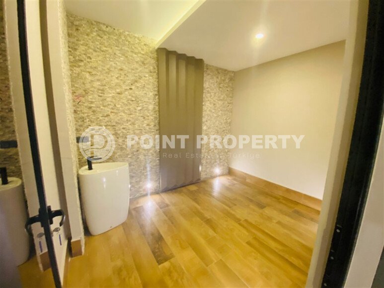 A modern, bright 2+1 apartment of 70 m² in the center of Alanya with luxurious infrastructure-id-10346-photo-9