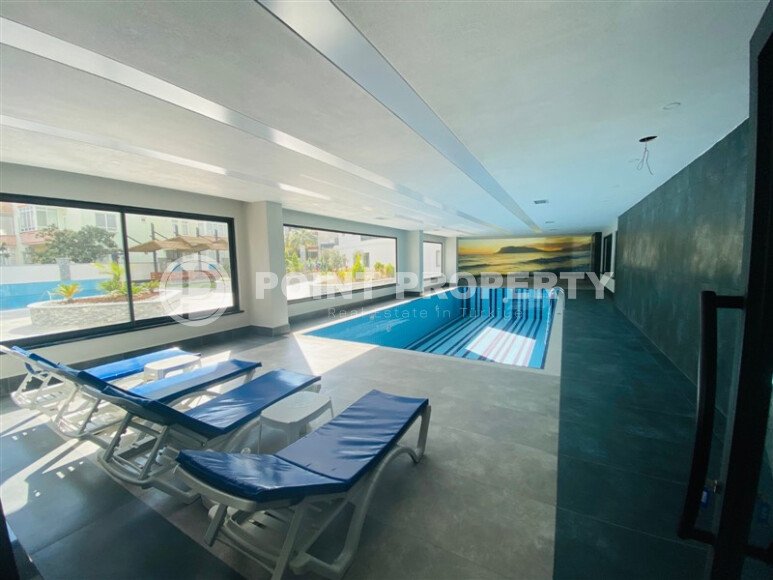 A modern, bright 2+1 apartment of 70 m² in the center of Alanya with luxurious infrastructure-id-10346-photo-11