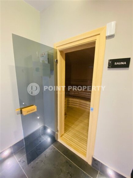 A modern, bright 2+1 apartment of 70 m² in the center of Alanya with luxurious infrastructure-id-10346-photo-12