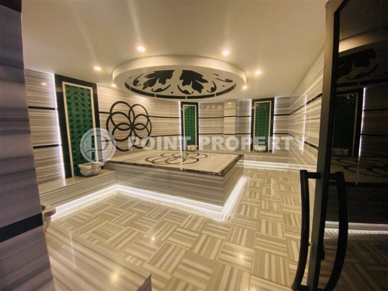 A modern, bright 2+1 apartment of 70 m² in the center of Alanya with luxurious infrastructure-id-10346-photo-13