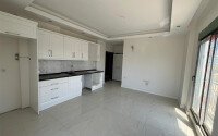 Modern apartment of 57 m² within walking distance of the sea, Mahmutlar-id-10349-photo-2