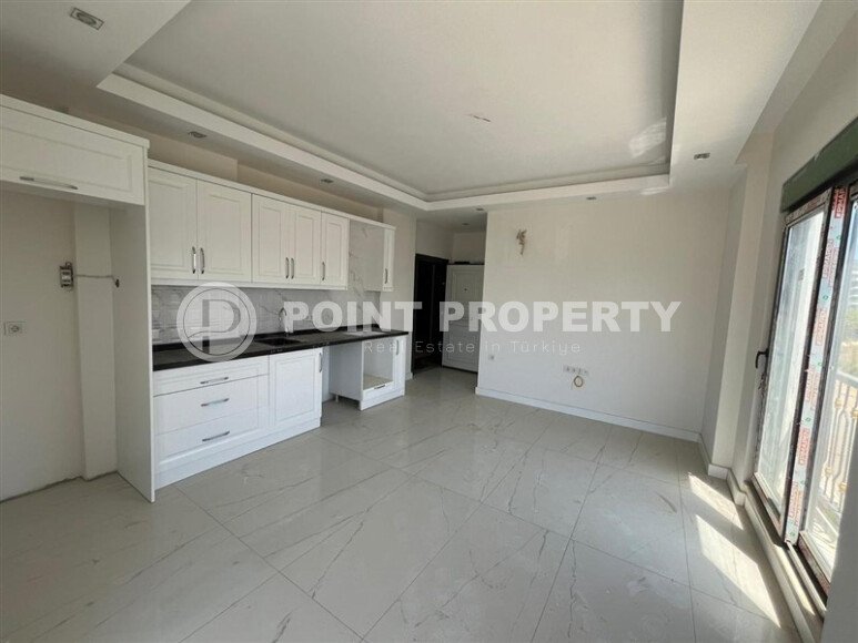 Modern apartment of 57 m² within walking distance of the sea, Mahmutlar-id-10349-photo-2