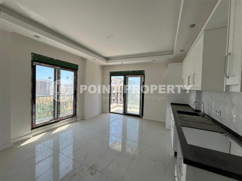 Modern apartment of 57 m² within walking distance of the sea, Mahmutlar-id-10349-photo-4