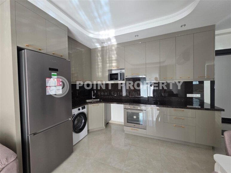 Spacious, stylish 58 m² apartment in Mahmutlar – a modern complex with infrastructure and a rental license-id-10350-photo-2
