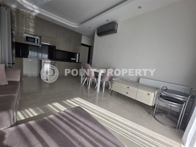 Spacious, stylish 58 m² apartment in Mahmutlar – a modern complex with infrastructure and a rental license-id-10350-photo-3