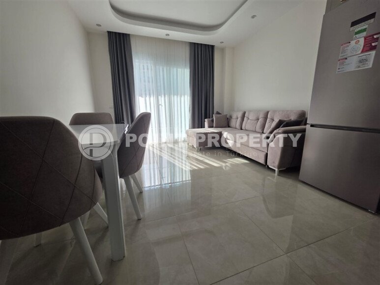 Spacious, stylish 58 m² apartment in Mahmutlar – a modern complex with infrastructure and a rental license-id-10350-photo-4