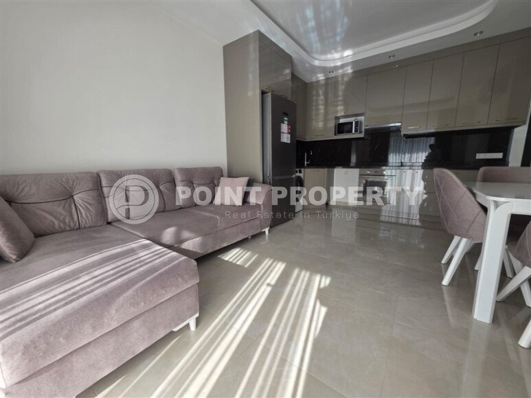 Spacious, stylish 58 m² apartment in Mahmutlar – a modern complex with infrastructure and a rental license-id-10350-photo-5