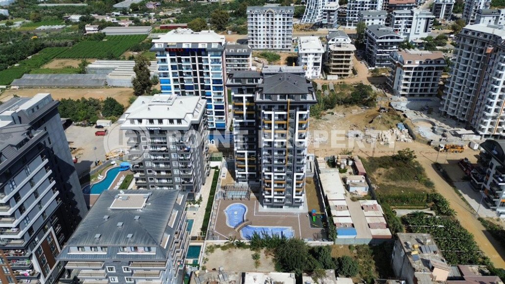 Apartments 1+1 and 2+1, 42-78m², in a complex under construction in Mahmutlar, Alanya, 400m from the sea-id-2447-photo-1