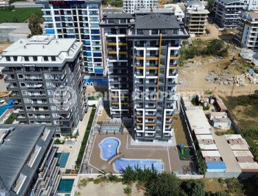 Квартиры 1+1 и 2+1, 42-78м², в комплексе на этапе строительства в Махмутларе, Алания, в 400м от моря-id-2447-фото-3