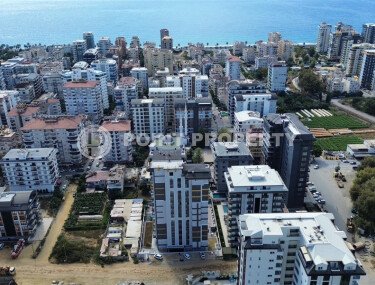 Квартиры 1+1 и 2+1, 42-78м², в комплексе на этапе строительства в Махмутларе, Алания, в 400м от моря-id-2447-фото-4