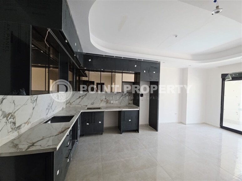 Большая светлая 1+1 квартира, 70 м², Махмутлар, престижный комплекс с богатой инфраструктурой-id-10356-фото-3