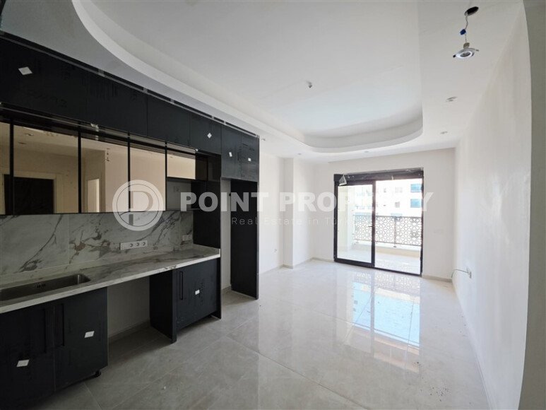 Большая светлая 1+1 квартира, 70 м², Махмутлар, престижный комплекс с богатой инфраструктурой-id-10356-фото-5