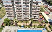 Просторная 120 м², район Махмутлар, рядом с пляжем, вид на море и горы-id-10357-фото-13