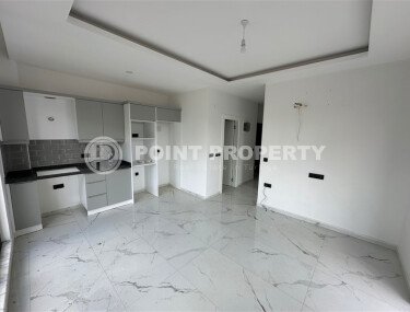 Элегантная современная квартира 47 м² в уютном жилом комплексе с развитой инфраструктурой в Махмутларе-id-10359-фото-11