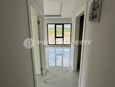 Элегантная современная квартира 47 м² в уютном жилом комплексе с развитой инфраструктурой в Махмутларе-id-10359-фото-3