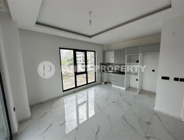 Элегантная современная квартира 47 м² в уютном жилом комплексе с развитой инфраструктурой в Махмутларе-id-10359-фото-4