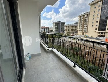 Элегантная современная квартира 47 м² в уютном жилом комплексе с развитой инфраструктурой в Махмутларе-id-10359-фото-5