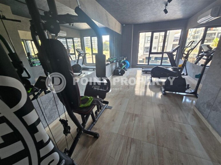 Элегантная современная квартира 47 м² в уютном жилом комплексе с развитой инфраструктурой в Махмутларе-id-10359-фото-12