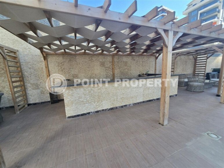 Элегантная современная квартира 47 м² в уютном жилом комплексе с развитой инфраструктурой в Махмутларе-id-10359-фото-15