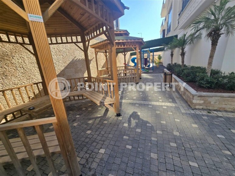 Элегантная современная квартира 47 м² в уютном жилом комплексе с развитой инфраструктурой в Махмутларе-id-10359-фото-20