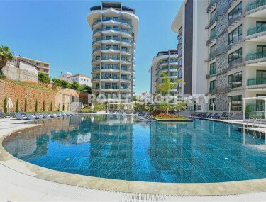 Стильные апартаменты 1+1, 54 м², район Тосмур, Аланья, с отдельным выходом на бассейн-id-10368-фото-2