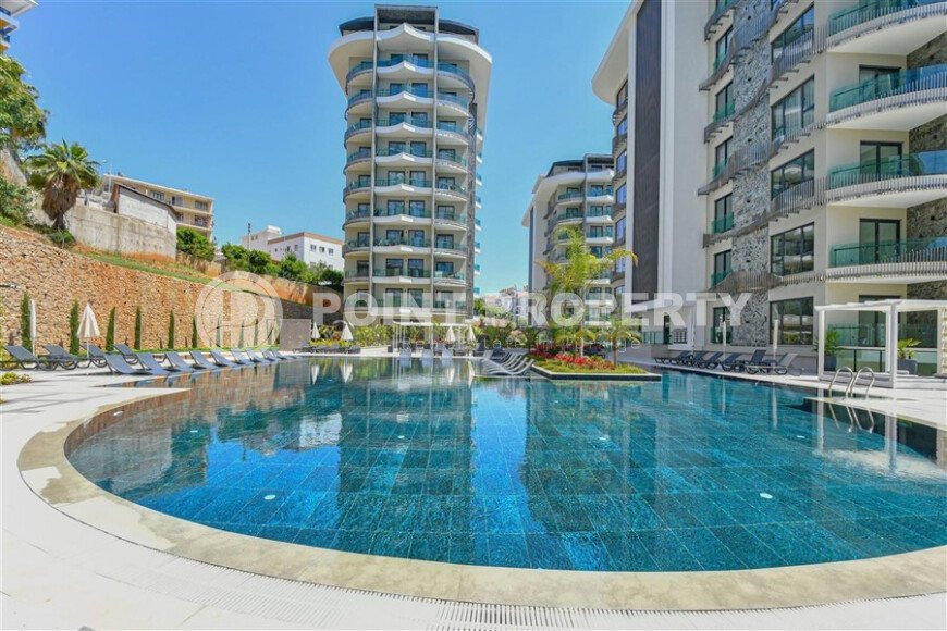 Стильные апартаменты 1+1, 54 м², район Тосмур, Аланья, с отдельным выходом на бассейн-id-10368-фото-1