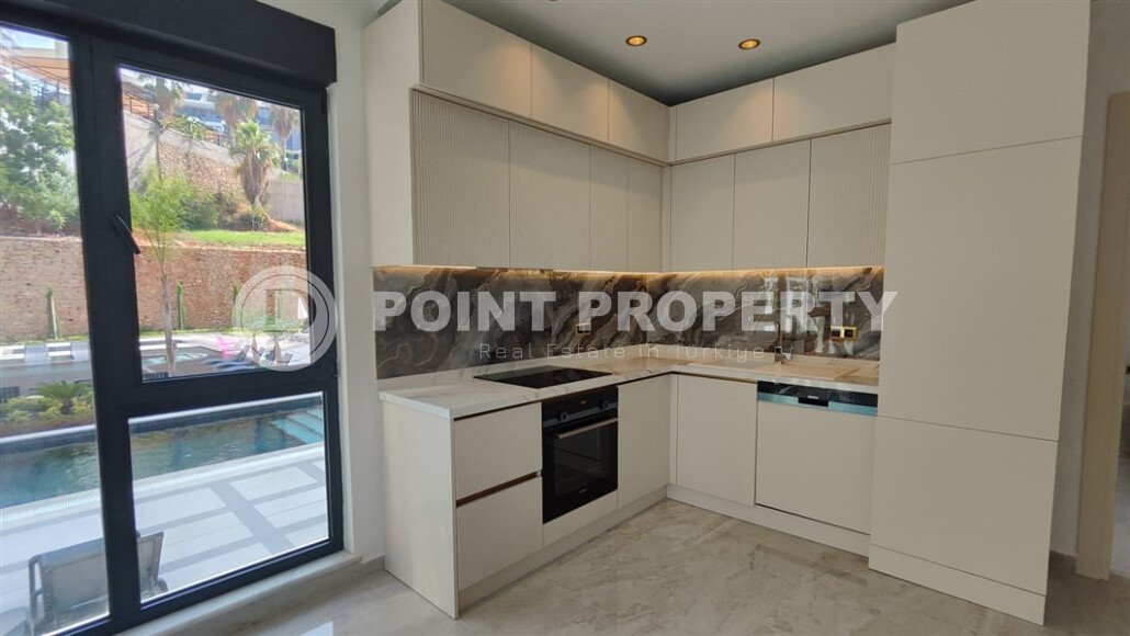 Стильные апартаменты 1+1, 54 м², район Тосмур, Аланья, с отдельным выходом на бассейн-id-10368-фото-2