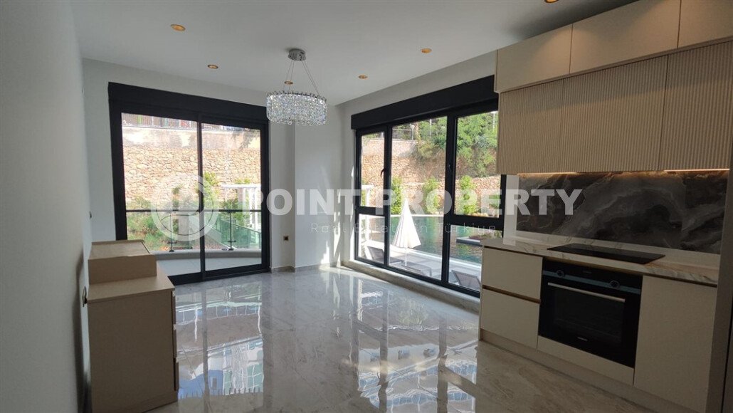 Стильные апартаменты 1+1, 54 м², район Тосмур, Аланья, с отдельным выходом на бассейн-id-10368-фото-3