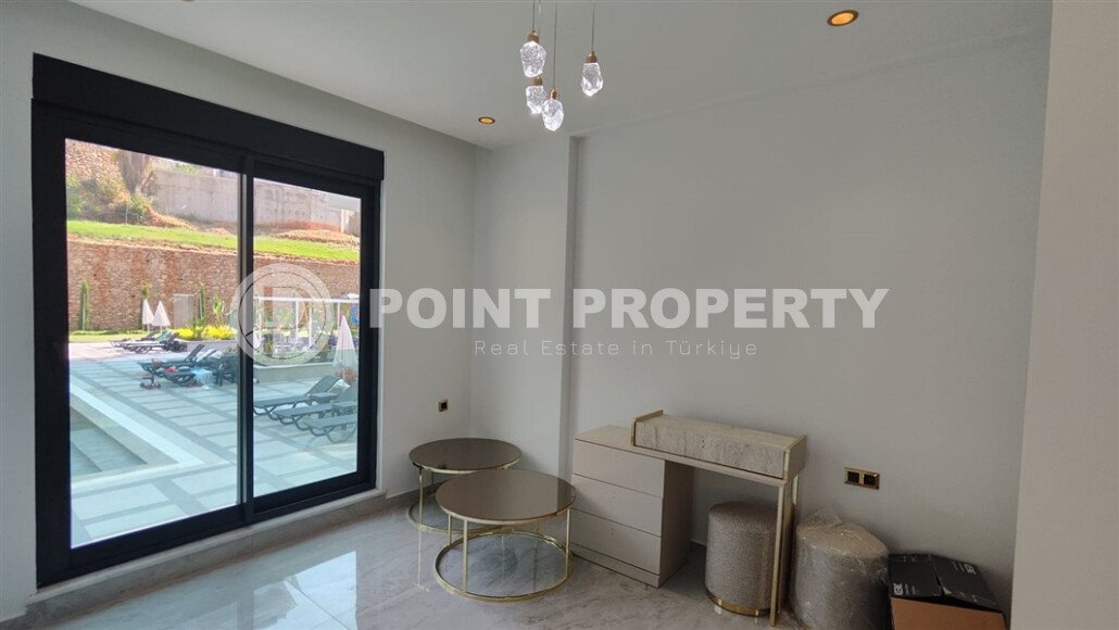 Стильные апартаменты 1+1, 54 м², район Тосмур, Аланья, с отдельным выходом на бассейн-id-10368-фото-7