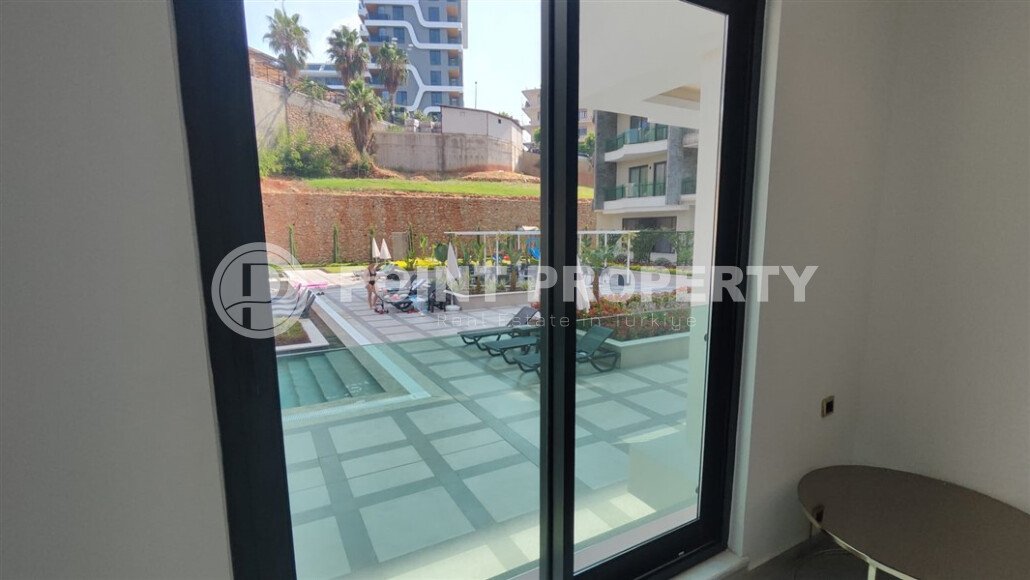 Стильные апартаменты 1+1, 54 м², район Тосмур, Аланья, с отдельным выходом на бассейн-id-10368-фото-8