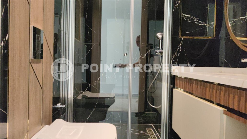 Стильные апартаменты 1+1, 54 м², район Тосмур, Аланья, с отдельным выходом на бассейн-id-10368-фото-9