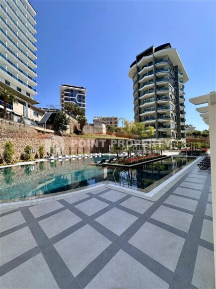 Стильные апартаменты 1+1, 54 м², район Тосмур, Аланья, с отдельным выходом на бассейн-id-10368-фото-16