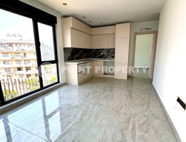 Modern apartment 1+1, 54 m², Tosmur district, Alanya, near the sea-id-10369-photo-2