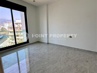 Modern apartment 1+1, 54 m², Tosmur district, Alanya, near the sea-id-10369-photo-5