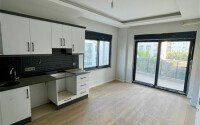 Новая квартира 1+1, 65 м², район Махмутлар, 150 м до моря-id-10373-фото-2