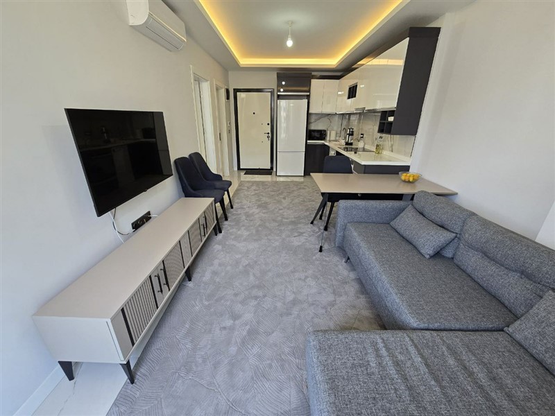 Современная квартира 1+1, 50 м², район Махмутлар, с крытой парковкой-id-10374-фото-7