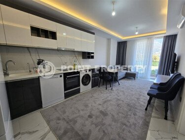 Современная квартира 1+1, 50 м², район Махмутлар, с крытой парковкой-id-10374-фото-3